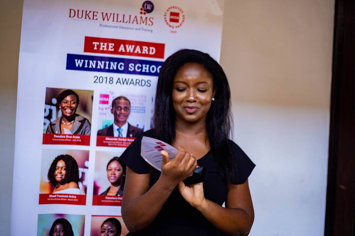Duke Williams students celebrating professional achievements